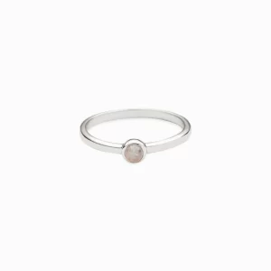 Minimalist moonstone ring set in a sleek sterling silver band.