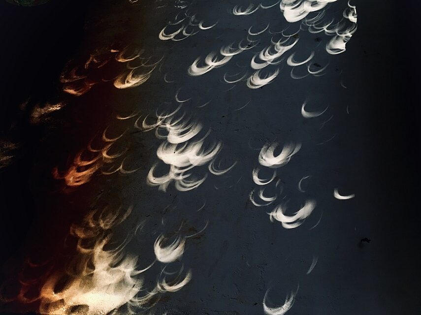 crescents created by the sun during an eclipse